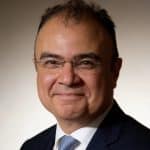 Dr Hisham Abdel Rahman, he has glasses and short dark hair