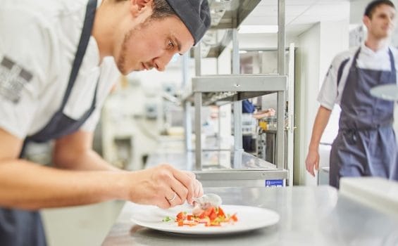 Picture of a Chef at Moller Institute preparing food