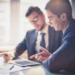 Discussing project Picture of two people working