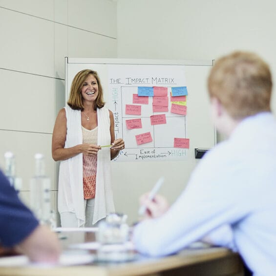 Picture of people at a flip chart at the Moller Institute