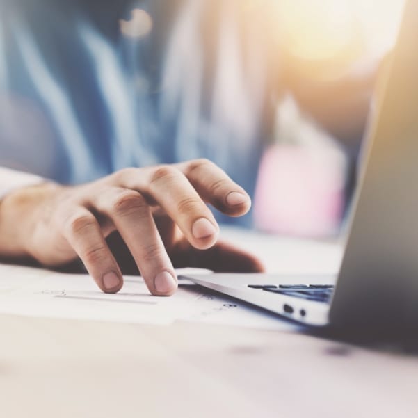 Online learning Picture of somebody learning at a computer doing executive coaching training
