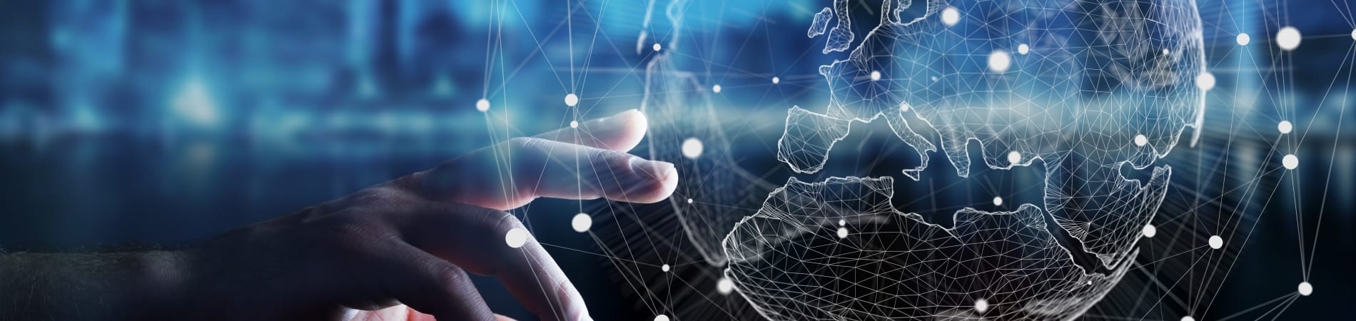 FDI web image Picture of a hand touching a globe