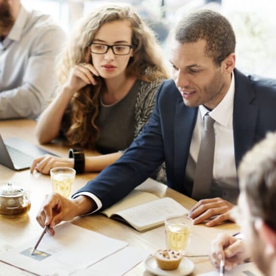 Picture of people working on the leading for impact training