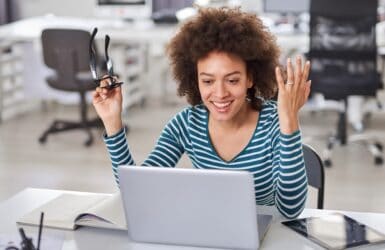 Picture of a lady working at a laptop