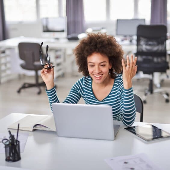 Picture of a lady working at a laptop