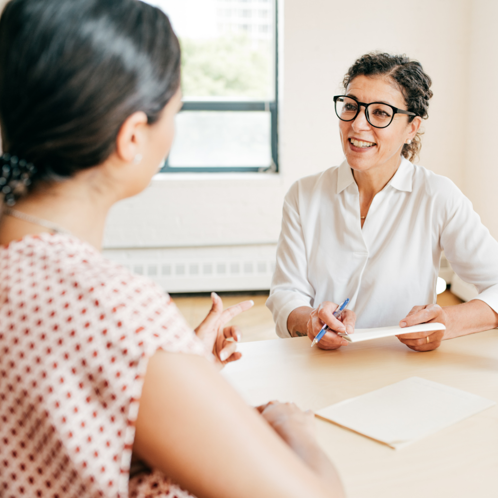 challenges Picture of two people in a business meeting