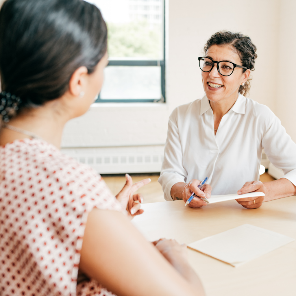 Picture of two people in a business meeting